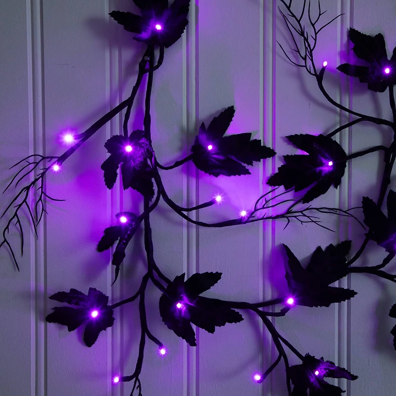 6.5ft. Pre-Lit Artificial Halloween Black Maple Garland with 48 Orange & Purple LED Lights