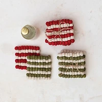 Hello Honey® 4" Cream & Red Handmade Wool Felt Ball Coasters, 4ct.
