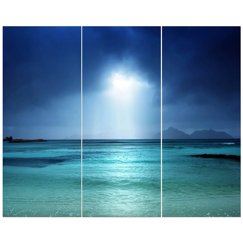 Designart - Blue sky on the beach of la Digue island Seychelles