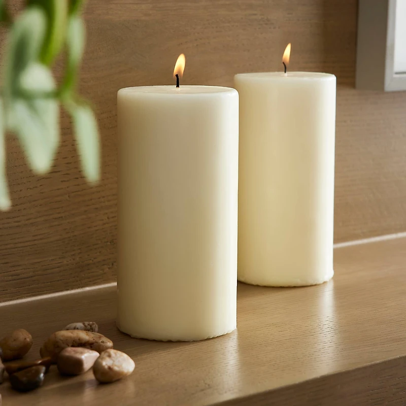 12 Packs: 2 ct. (24 total) Ivory Pillar Candle Pair by Ashland®