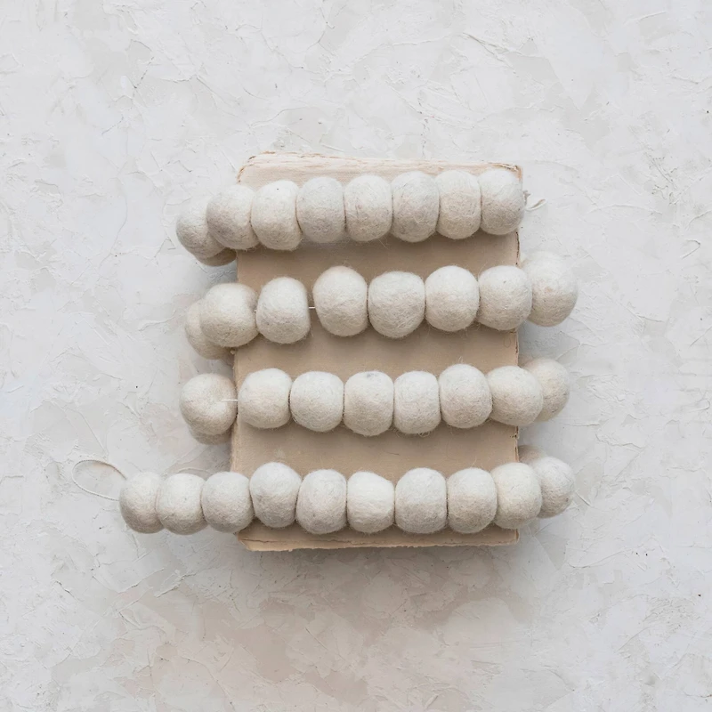 Hello Honey® 6ft. Cream Handmade Wool Felt Ball Garland