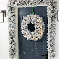 Glitzhome® 9ft Pre-Lit Snow Flocked Greenery Pine Christmas Garland with Timer