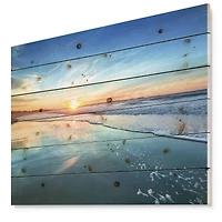 Designart - Blue Seashore with Distant Sunset