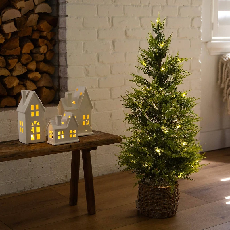 3ft. Pre-Lit Artificial Lightly Snowed Cypress Christmas Tree with 38 Warm White LED Lights in Decorative Weaved Basket