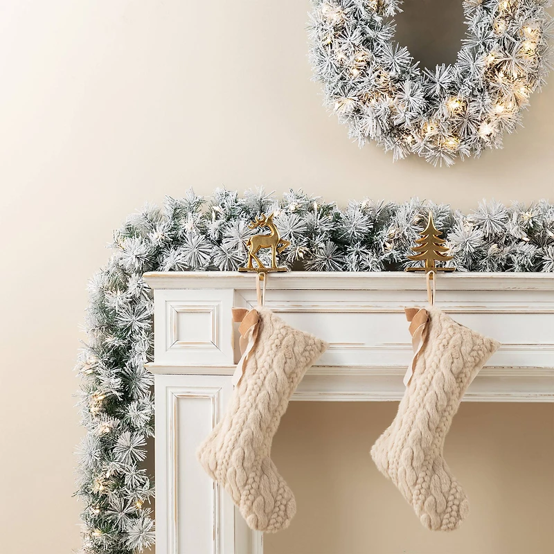 Glitzhome® 6ft Pre-Lit Snow Flocked Greenery Pine Christmas Garland with Timer, 2ct.