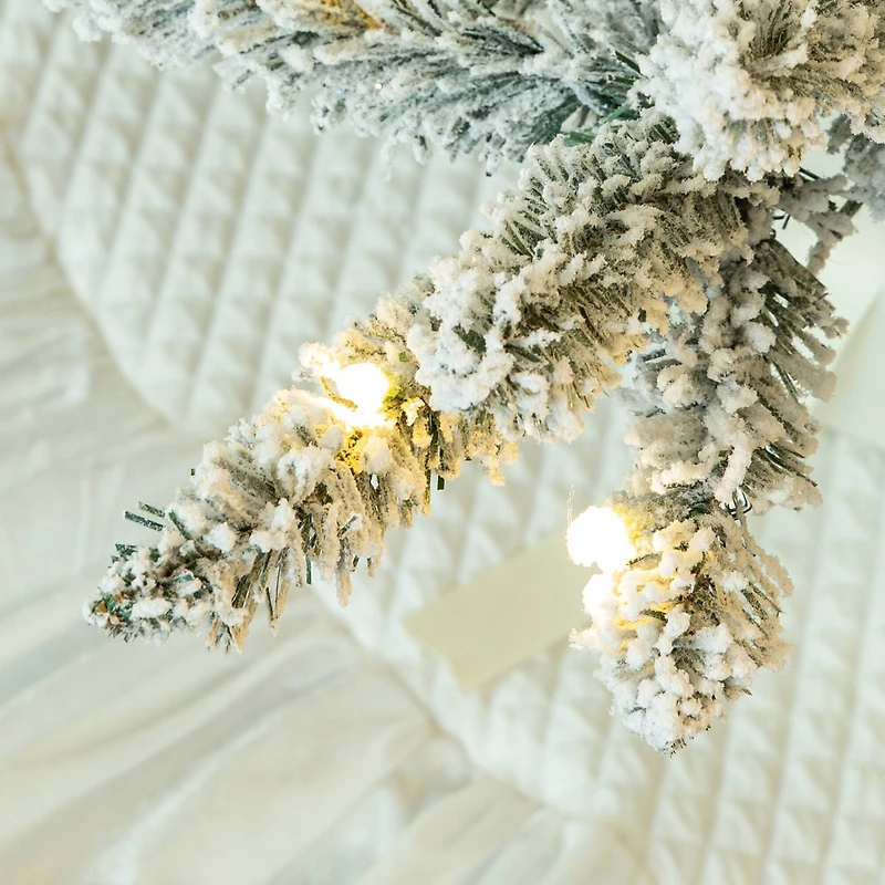 10ft. Pre-Lit Flocked Fir Artificial Christmas Tree, Warm White Lights