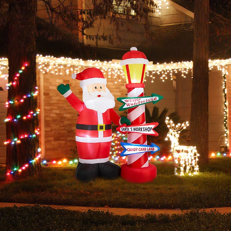 Glitzhome® 7FT Lighted Inflatable Santa with Lamp Post Sign Decor