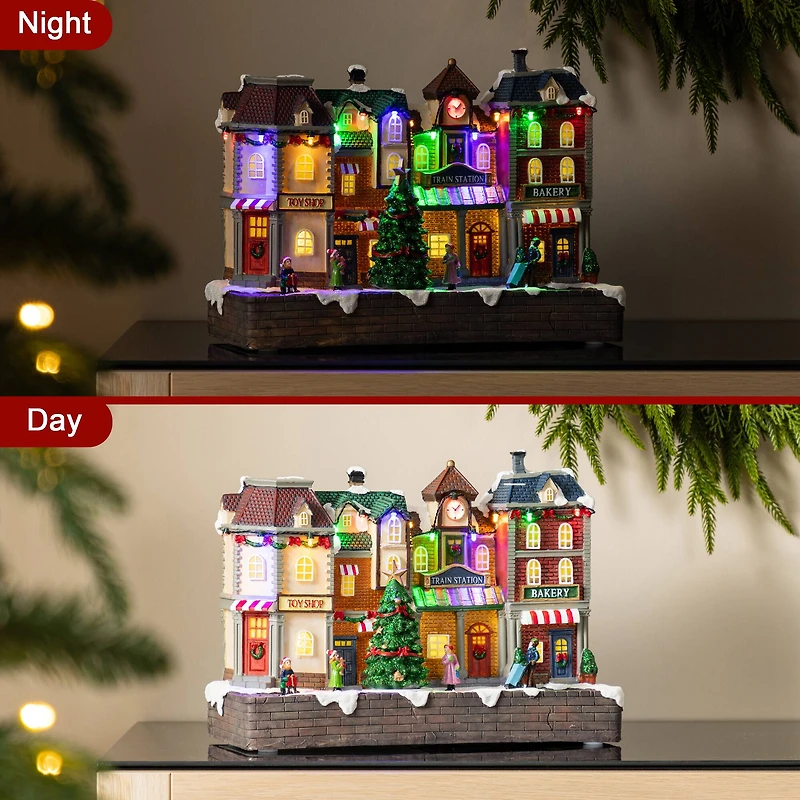 Glitzhome® 13.75" Lighted Christmas Train station Resin Village with Movement and Music