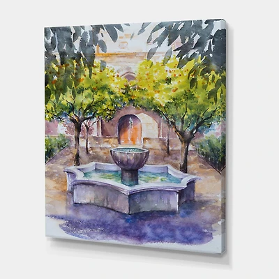 Designart - Small Fountain Picture With Trees In The Village