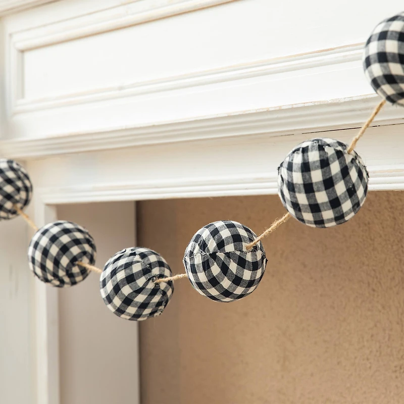Glitzhome® 6ft. Black & White Plaid Fabric Garland