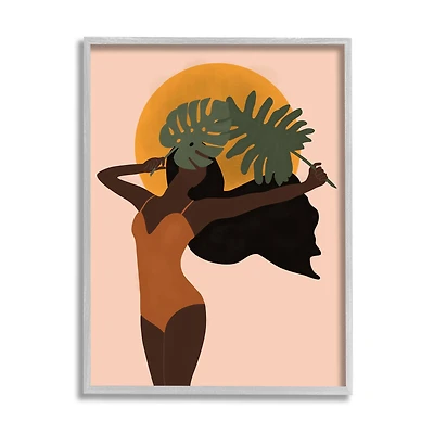 Stupell Industries Female Holding Tropical Monstera Leaf under Sun in Frame Wall Art