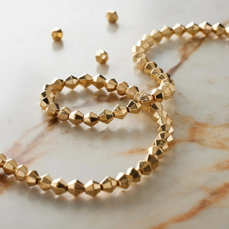 Gold Metal Faceted Bicone Beads, 4mm by Bead Landing™