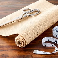 Natural Laminated Burlap Fabric Roll by Loops & Threads® 
