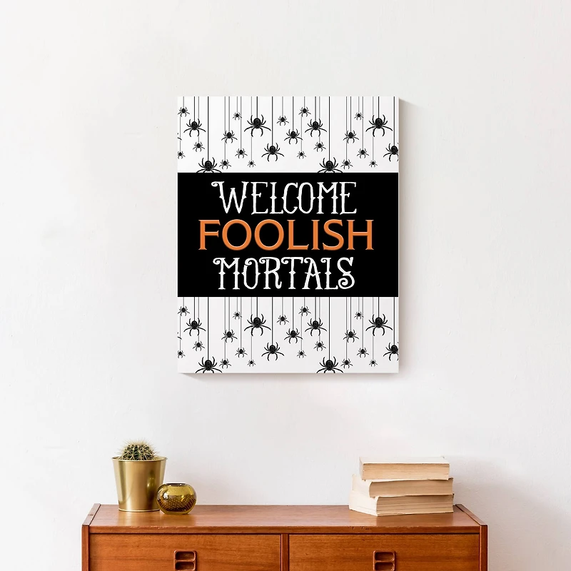 Welcome Foolish Mortals Canvas Wall Art