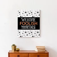 Welcome Foolish Mortals Canvas Wall Art