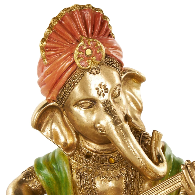 10.75" Gold Ganesh Musician Decorative Sculpture with Green, Yellow, and Red Accents