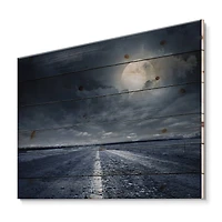Designart - Asphalt Road Under Cloudy Full Moon I
