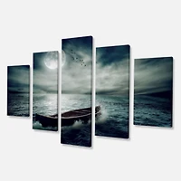 Designart - Boat Drifting Away After Storm - Large Seashore Canvas Art Print