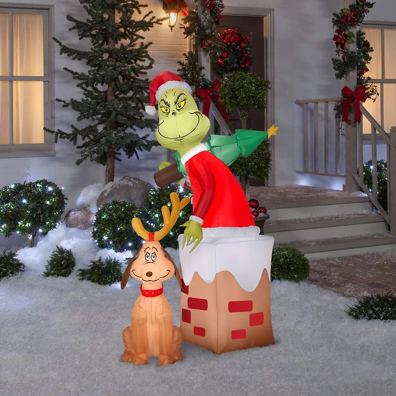 5.5ft. Airblown® Inflatable Christmas Grinch & Max Chimney Scene