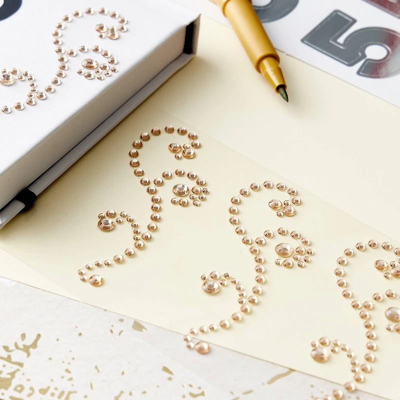 12 Packs: 4 ct. (48 total) Gold Rhinestone Flourish Stickers by Recollections™