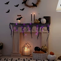 4ft. Pre-Lit Purple LED Halloween Black Gauze Drape Lights