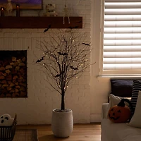 5ft. Pre-Lit Artificial Halloween Black Twig Tree with Bats and 50 Warm White LED Lights