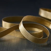 12 Pack: 1/4" x 15yd. Lamé Gold Ribbon by Celebrate It® 360°™
