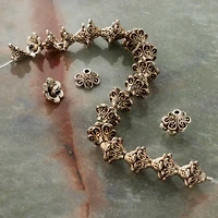 12 Packs: 34 ct. (408 total)  Silver Metal Cap-Shaped Beads, 9mm by Bead Landing™