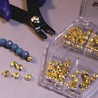 The Beadsmith® Gold Plated Crimp Bead Cover, 80ct.