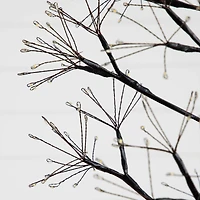 6ft. Pre-Lit Artificial Halloween Black Starburst Tree with 1680 Fairy Warm White LED Lights