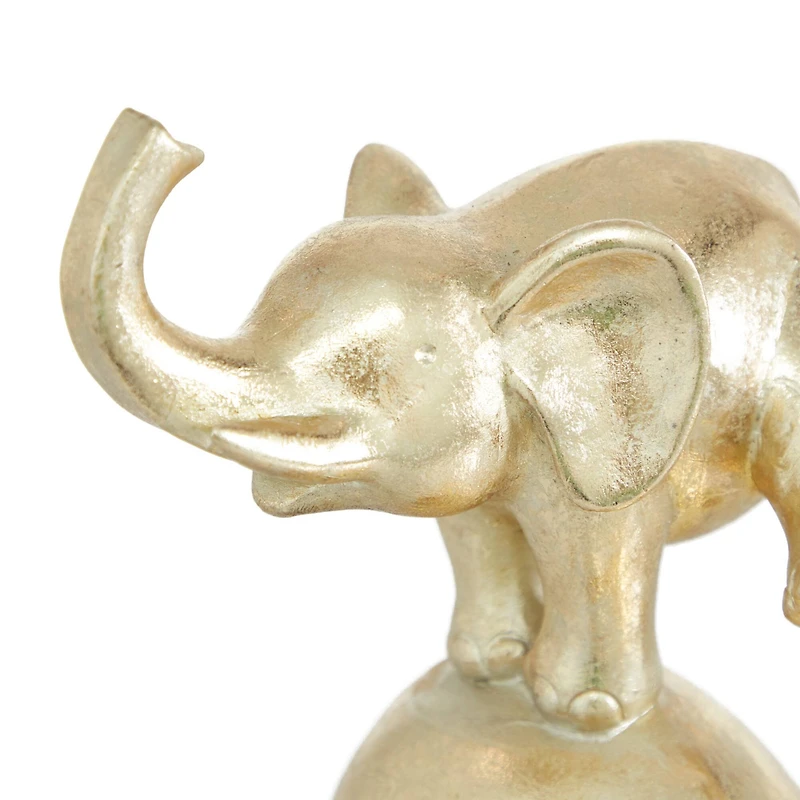 Gold Polystone Contemporary Elephant Sculpture, 10" x 8" x 6"
