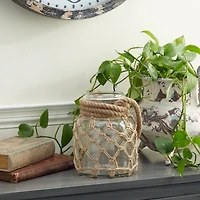 The Novogratz Brown Glass Coastal Lantern, 9" x 7" x 8"