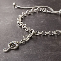 12 Pack: Treble Clef Charm by Bead Landing™