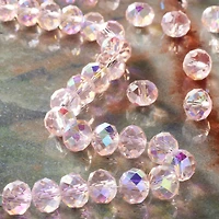 12 Pack: Aurora Borealis Pink Glass Faceted Oval Beads, 10mm by Bead Landing™