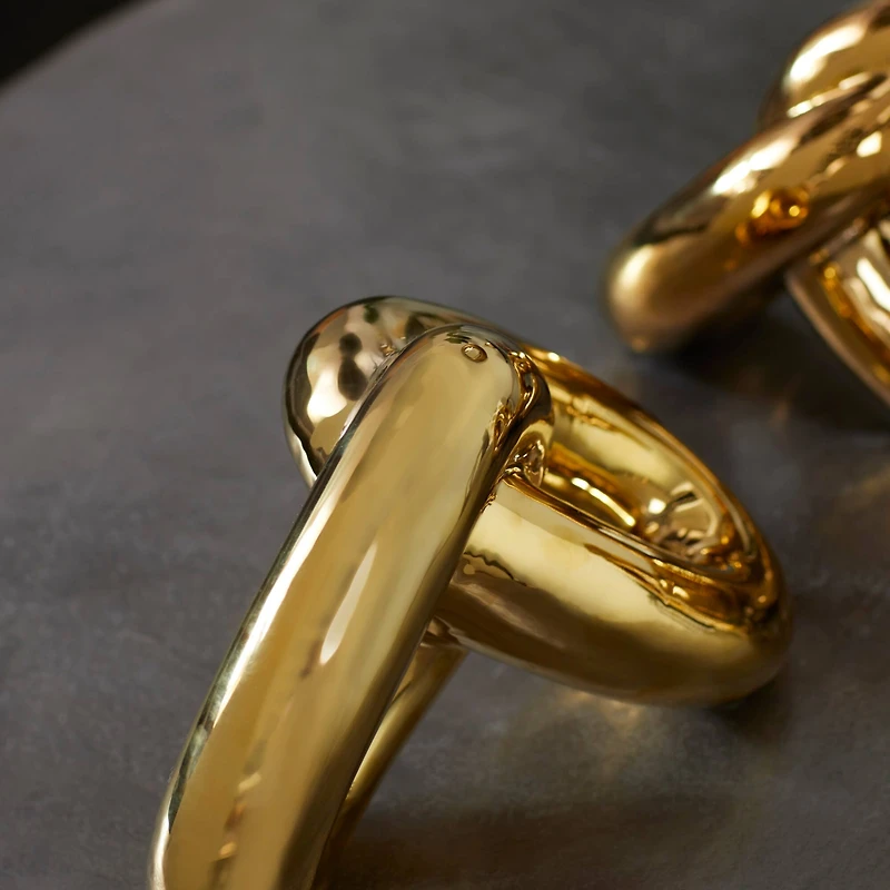 CosmoLiving by Cosmopolitan Gold Porcelain Glam Chain Sculpture Set