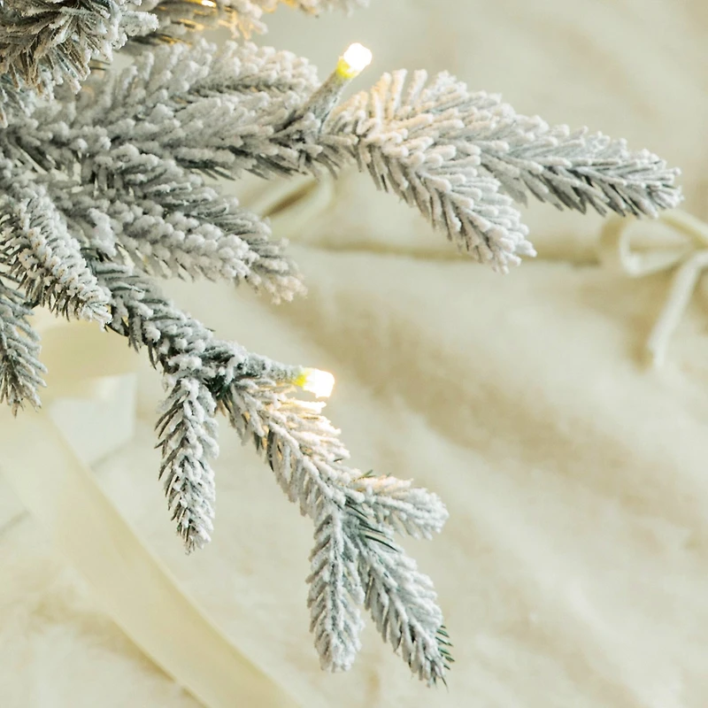 10ft. Pre-Lit Deluxe Flocked Fir Artificial Christmas Tree, Warm White Lights