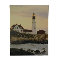 LED Lighthouse on the Shoreline Canvas Wall Art