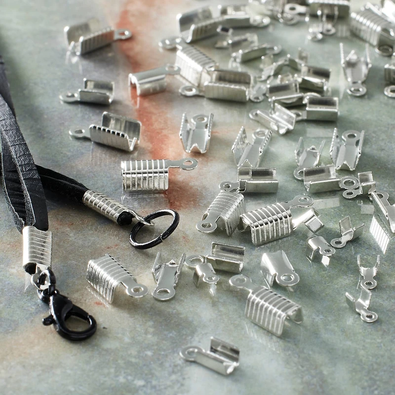 12 Packs: 168 ct. (2,016 total) Silver Crimp Cord End Caps by Bead Landing™