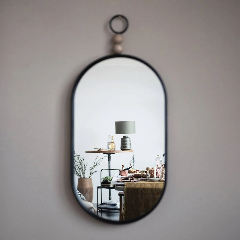 Hello Honey® Black Oval Metal Wall Mirror with Wood Beads