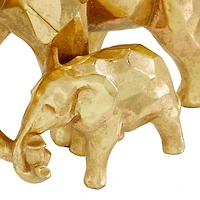 CosmoLiving by Cosmopolitan 10" Gold Modern Elephant Sculpture
