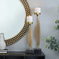The Novogratz Gold Stainless Steel Vertical Pipe Stand Candle Holder Set