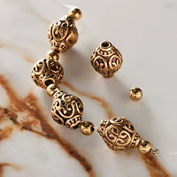 Antique Gold Metal Bicone Beads by Bead Landing™