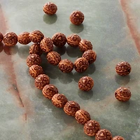 12 Packs: 32 ct. (384 total)  Amber Heart Design Resin Round Beads, 10mm by Bead Landing™