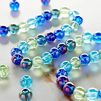 12 Pack: Aqua Mix Clear Glass Beads, 6mm by Bead Landing™