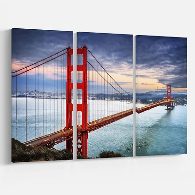 Designart - Golden Gate under Cloudy Sky