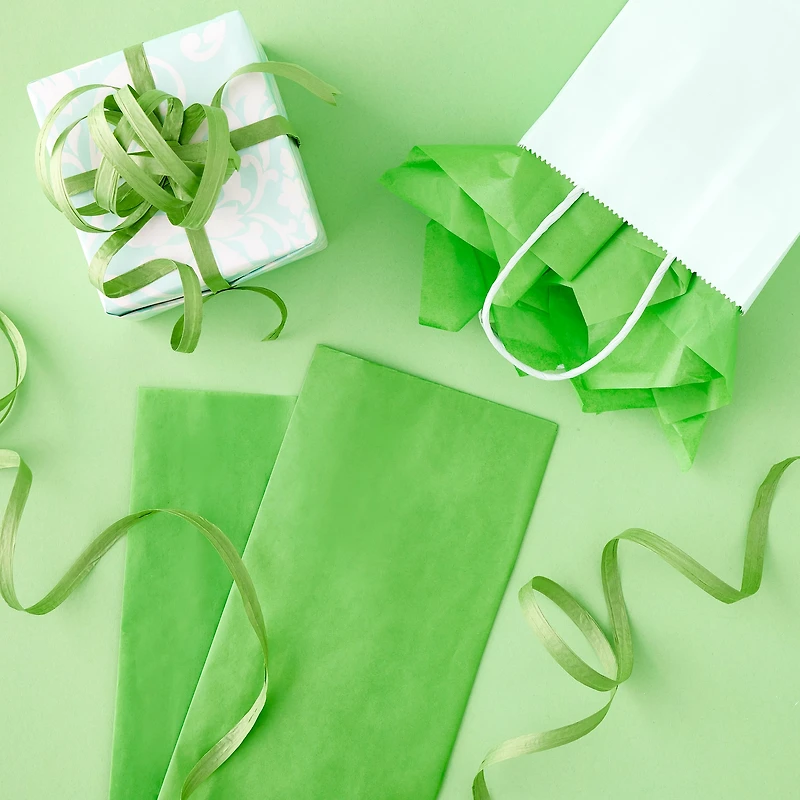 24 Packs: 12 ct. (288 total) Festive Green Tissue Paper by Celebrate It™