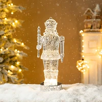 Glitzhome® 12.5" Lighted Acrylic Crystal Nutcracker Figurine Waterglobe