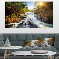 Designart - Waterfall through the Forest