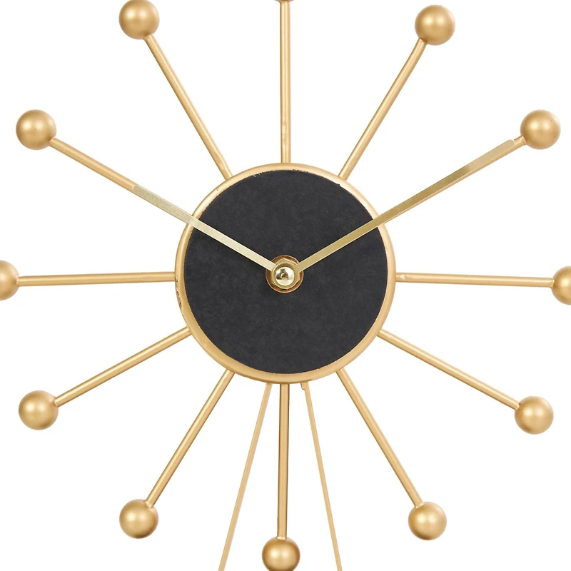 CosmoLiving by Cosmopolitan 12" Gold Metal Sunburst Clock with Black Base & Clockface