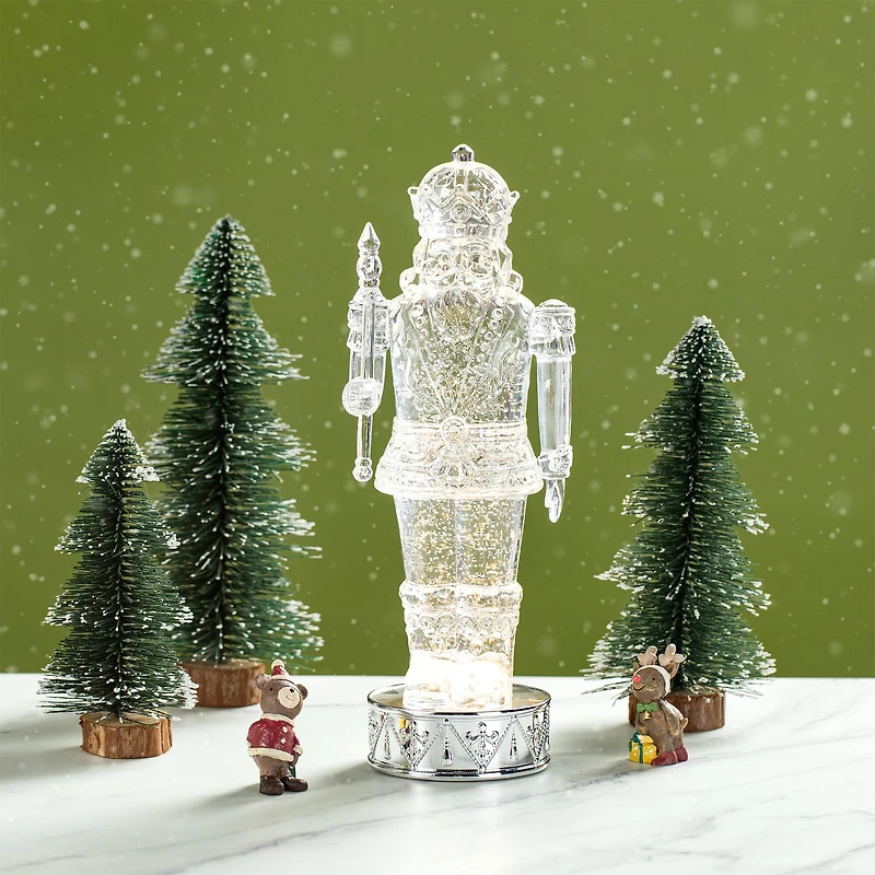 Glitzhome® 12.5" Lighted Acrylic Crystal Nutcracker Figurine Waterglobe